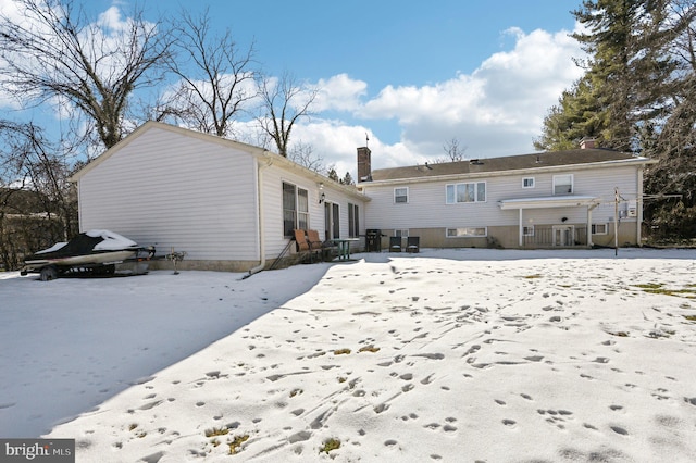 view of snow covered property