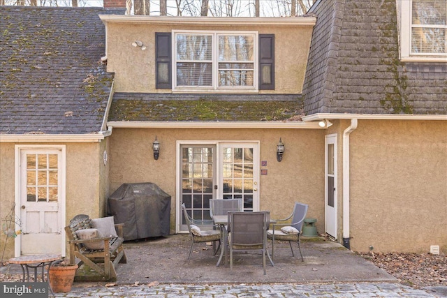 rear view of house with a patio area