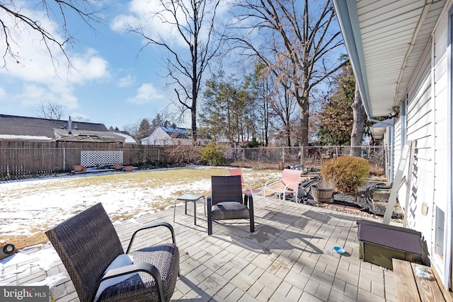 view of snow covered patio