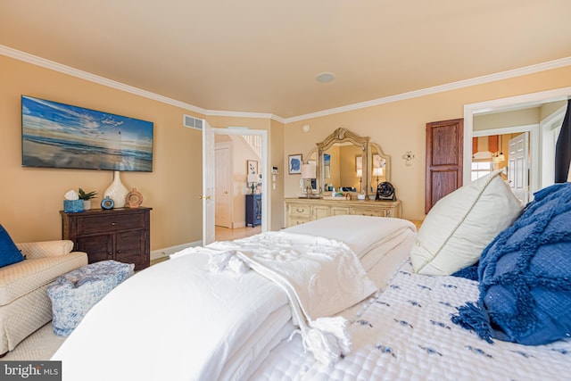 bedroom featuring crown molding