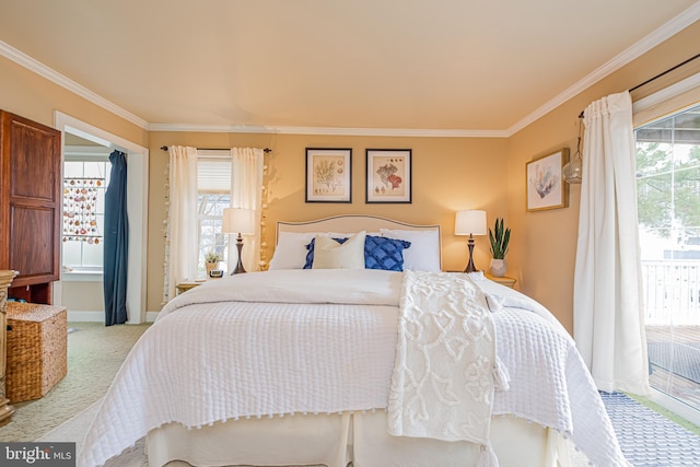 carpeted bedroom with access to outside and ornamental molding