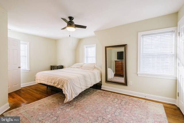 bedroom featuring hardwood / wood-style floors and ceiling fan