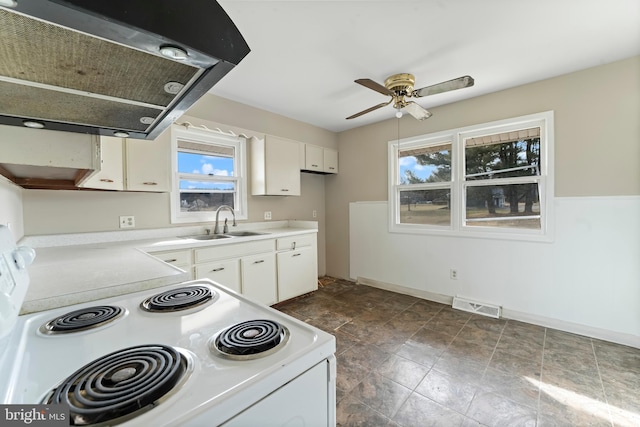 kitchen with sink, white cabinetry, electric range, ceiling fan, and exhaust hood