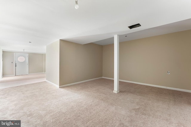 basement with light carpet