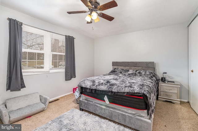 bedroom featuring carpet floors and ceiling fan