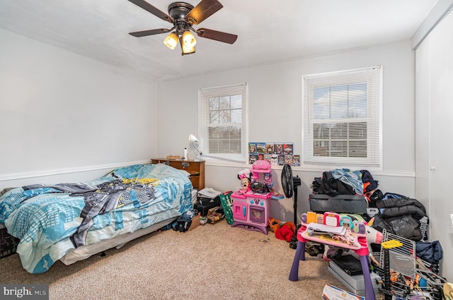 bedroom featuring ceiling fan and carpet flooring