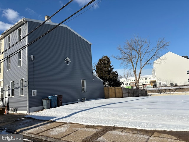 view of snow covered property