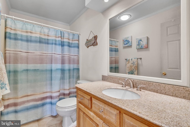 bathroom with ornamental molding, vanity, toilet, and tile patterned floors