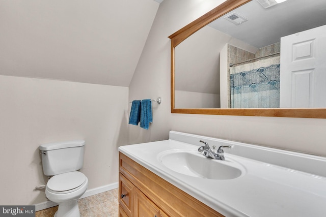 bathroom with lofted ceiling, tile patterned floors, toilet, vanity, and a shower with shower curtain