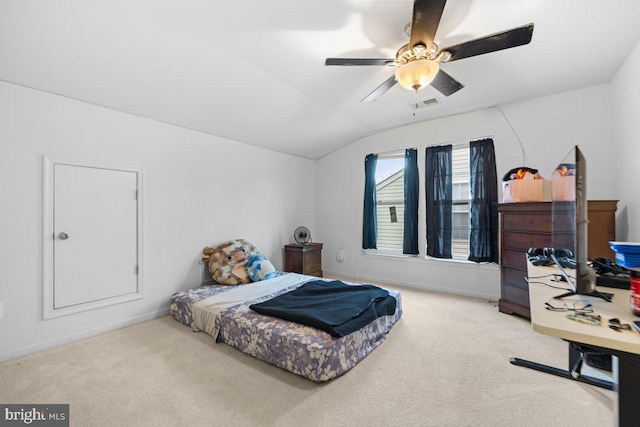 bedroom with lofted ceiling, carpet flooring, and ceiling fan