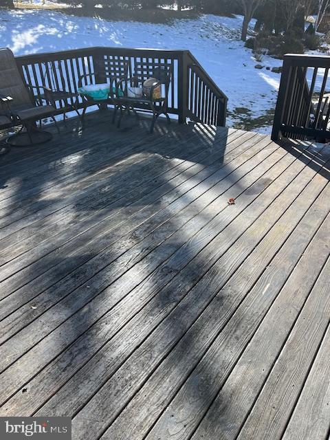 view of snow covered deck