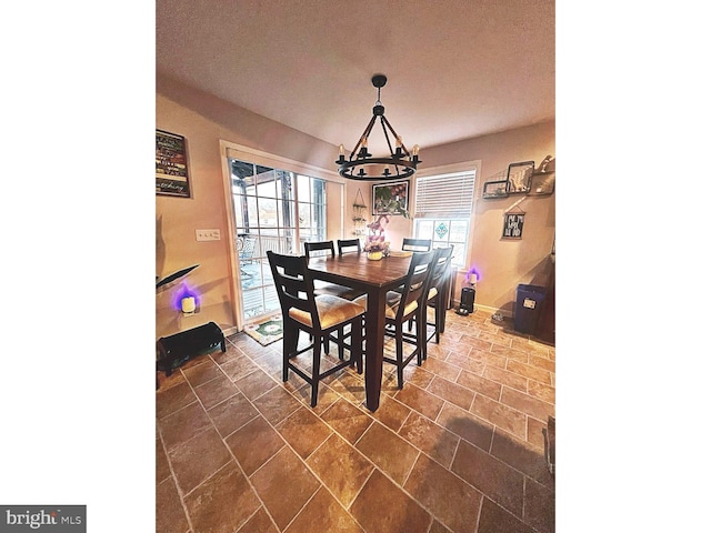 dining room with a chandelier