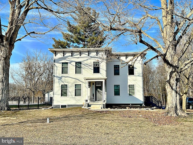 italianate house with fence