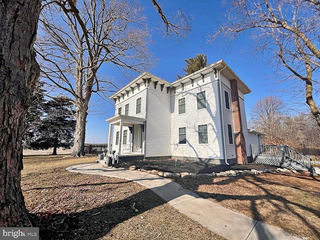 view of home's exterior featuring a porch