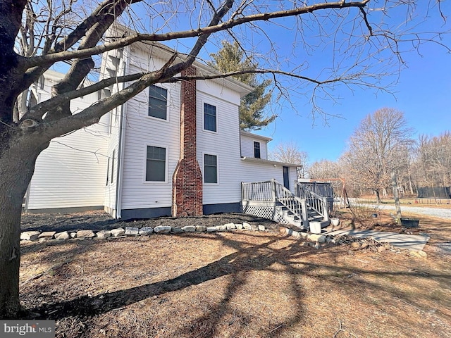 exterior space featuring a deck