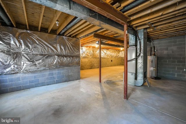 basement featuring electric water heater