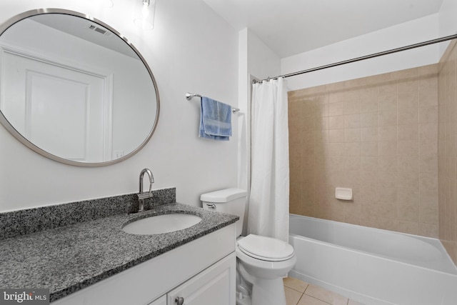 full bathroom featuring tile patterned flooring, vanity, shower / tub combo, and toilet