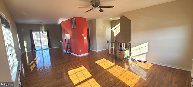 interior space featuring dark hardwood / wood-style floors and ceiling fan