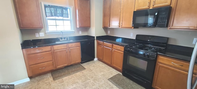 kitchen featuring sink and black appliances