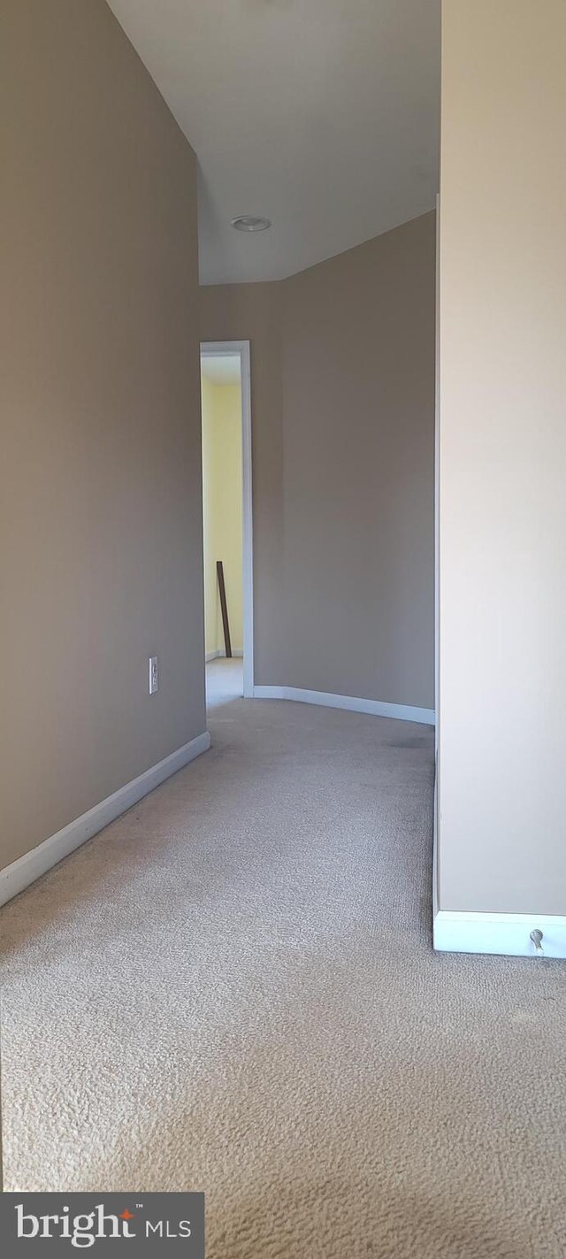 unfurnished room with carpet floors