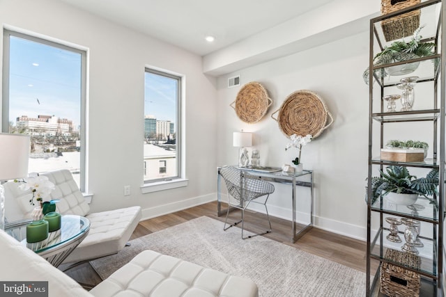 office area with hardwood / wood-style floors