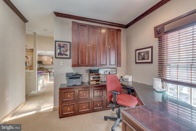 office featuring crown molding and light colored carpet