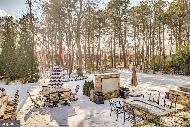 view of snow covered patio