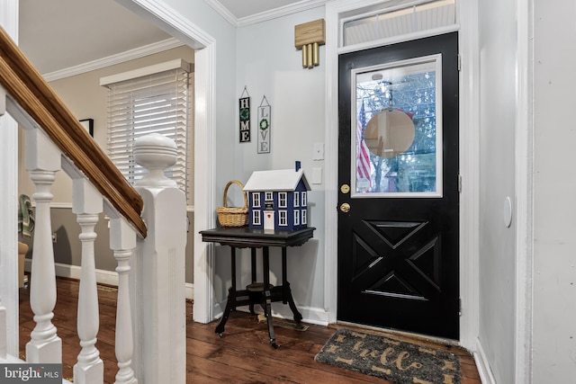 foyer with crown molding and dark hardwood / wood-style floors