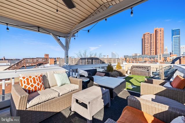 view of patio / terrace with outdoor lounge area and ceiling fan