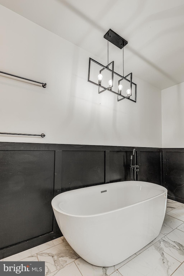 bathroom featuring a tub to relax in