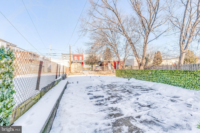 view of snowy yard