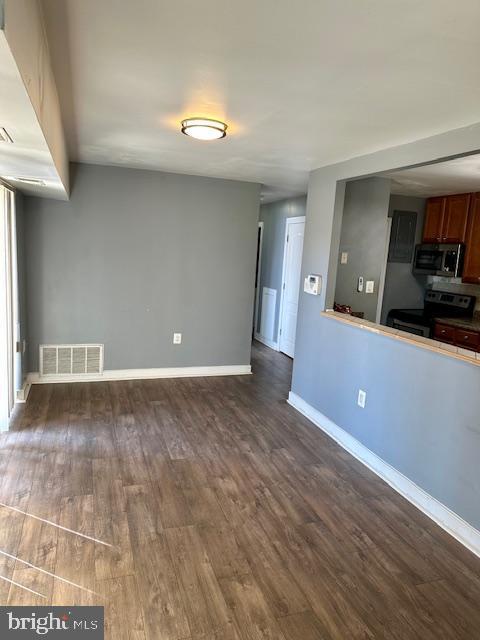 interior space featuring dark hardwood / wood-style floors