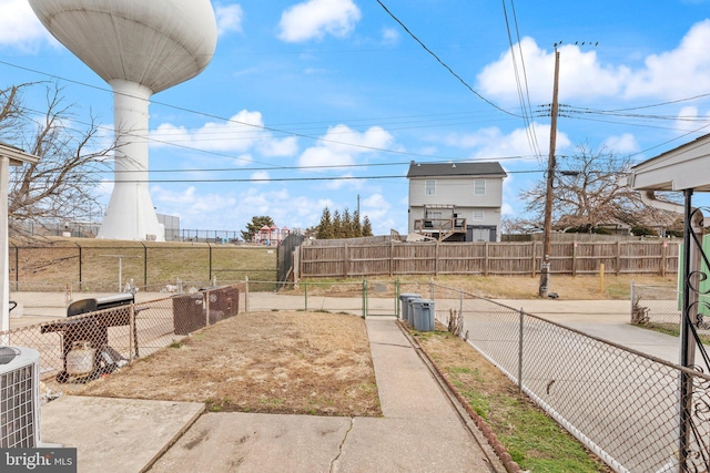 view of yard with central AC unit