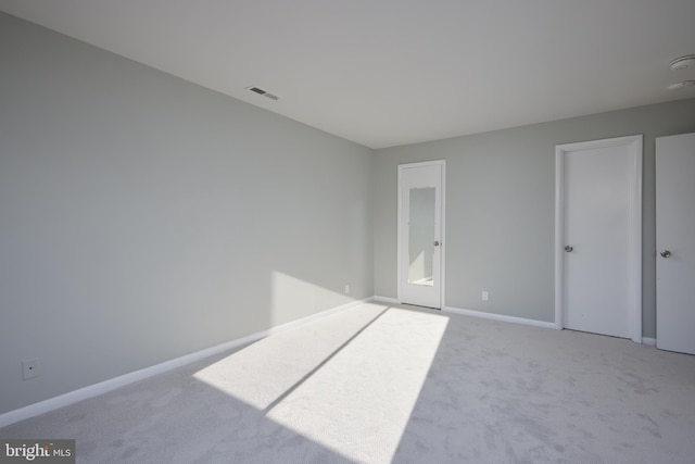 unfurnished bedroom with carpet