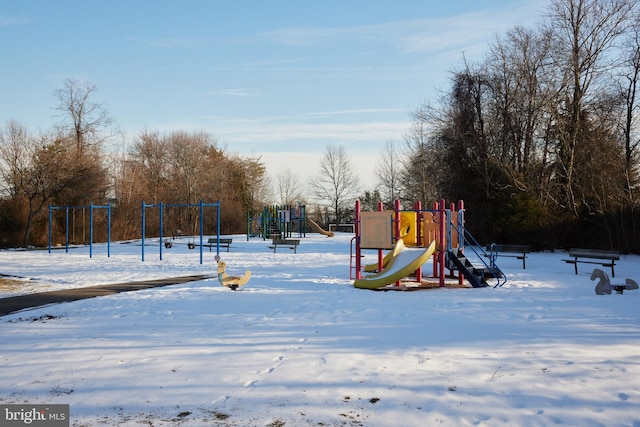 view of snow covered playground