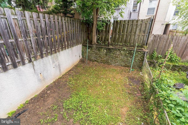 view of yard with fence