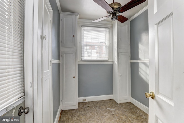 spacious closet with ceiling fan