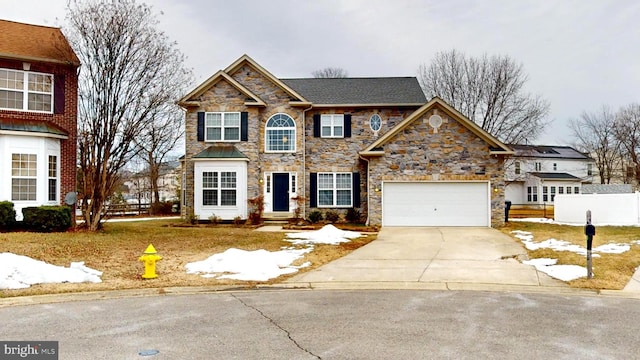 view of front of home with a garage