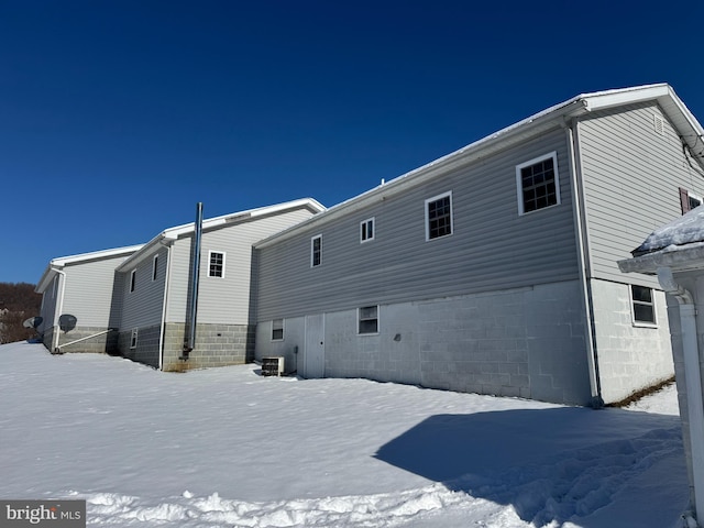 view of snow covered property