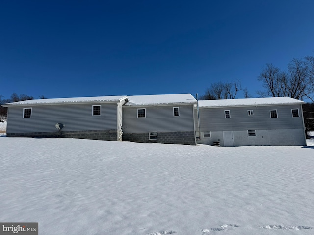 view of snow covered house