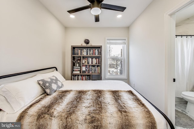 bedroom with connected bathroom and ceiling fan