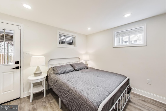 bedroom featuring wood-type flooring