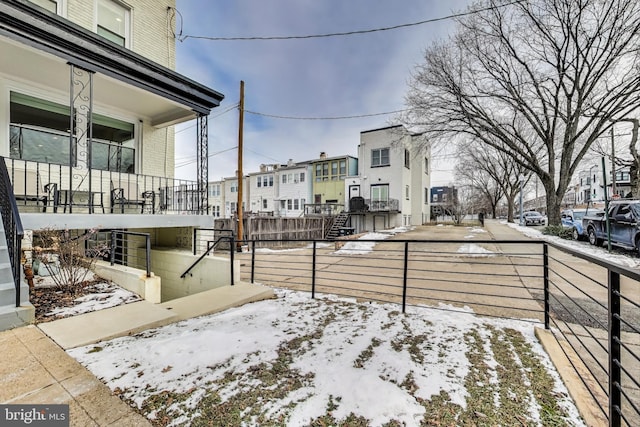 view of snow covered deck