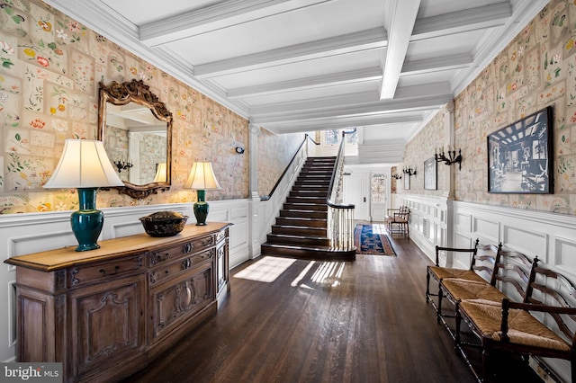 hallway featuring coffered ceiling, crown molding, dark hardwood / wood-style floors, and beamed ceiling