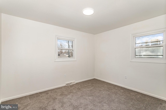 view of carpeted spare room