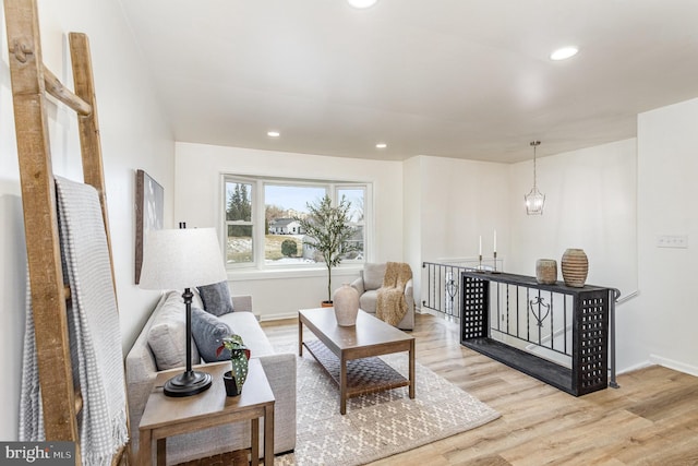 living room with light hardwood / wood-style floors