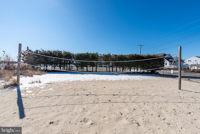 view of property's community featuring volleyball court