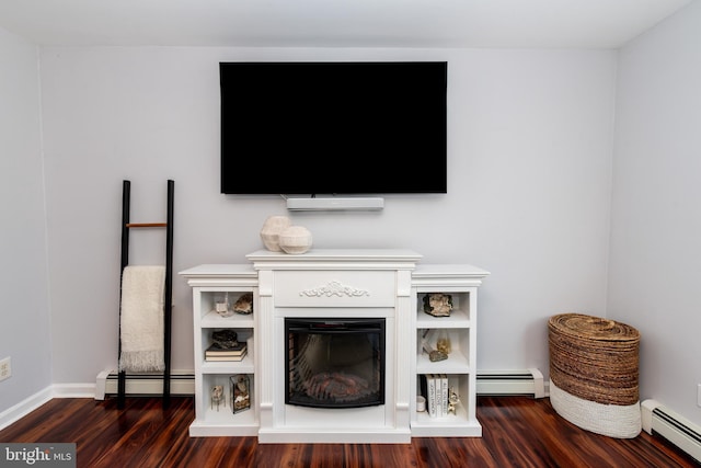 interior details with hardwood / wood-style floors and baseboard heating