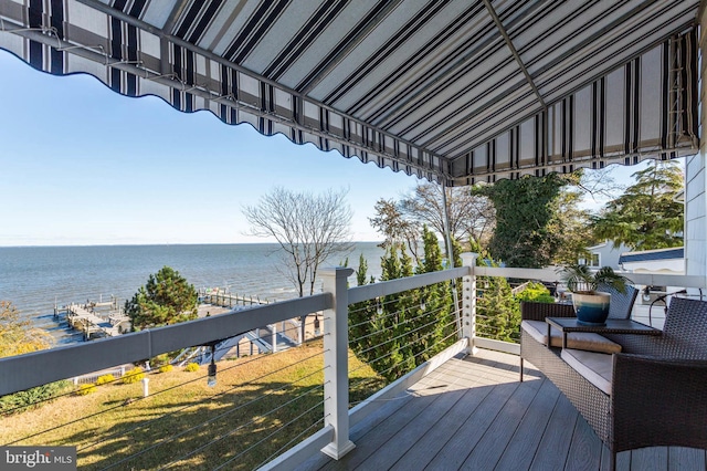 deck featuring a water view