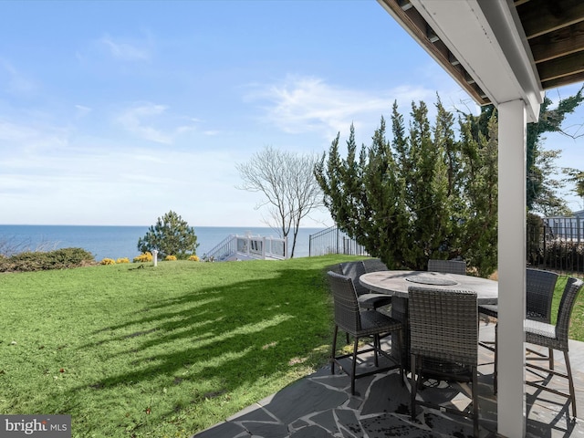 view of patio / terrace with a water view